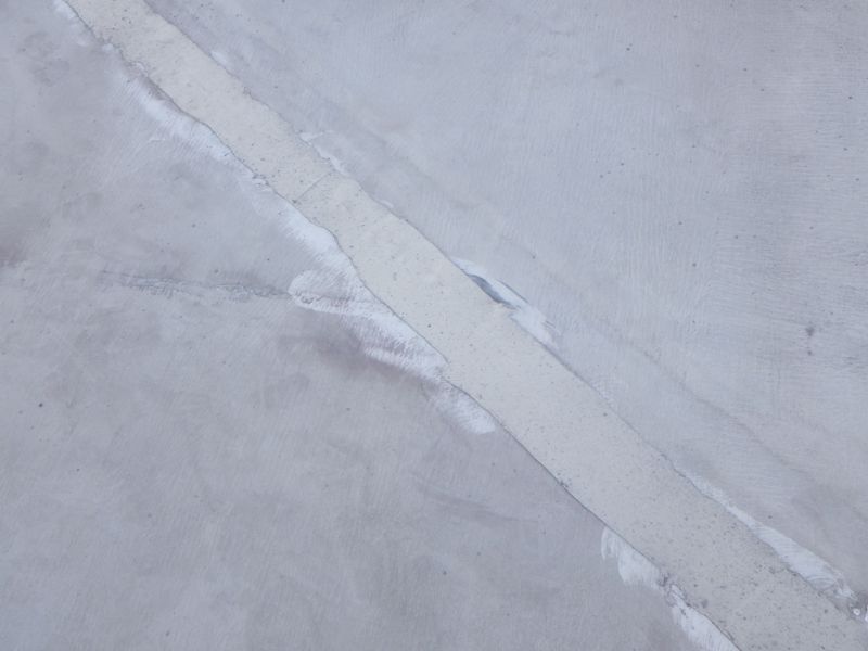 防水シート劣化部分の段差修復